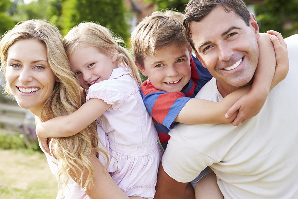 Photo of smiling family